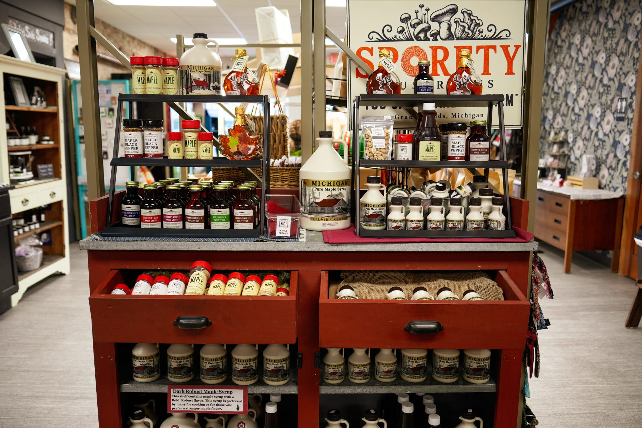 Antique cabinets displaying local honey and pantry goods