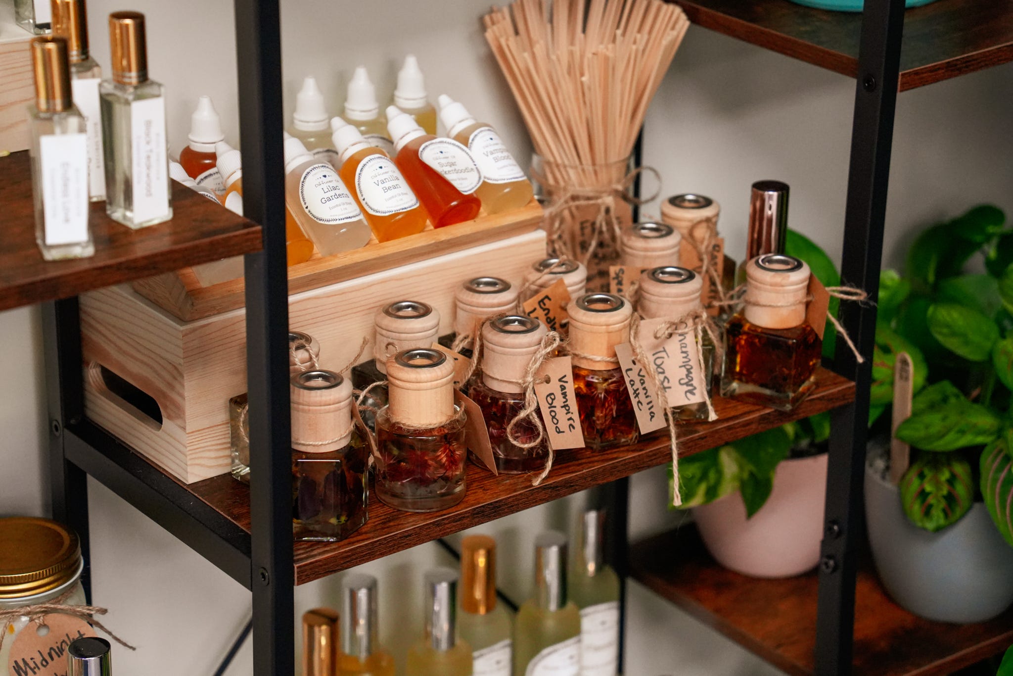 Shelf of handmade candles and home goods